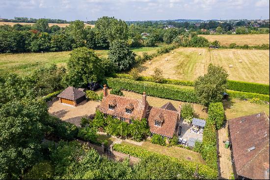 A beautifully remodelled Grade II listed cottage set on the rural edge of a Kent village a