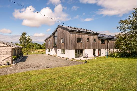 A stunning, contemporary barn conversion offering beautifully presented and substantial fa