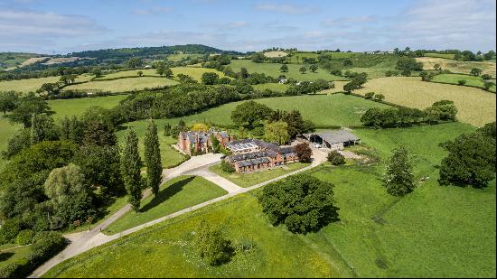 A charming Manor House in the heart of Marshwood Vale, with extensive ancillary accommodat