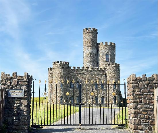 An exceptional Grade II listed castle situated on a hilltop in 8.41 acres of private groun