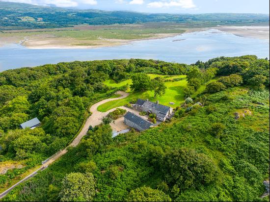 A beautifully appointed Welsh long house with versatile outbuildings surrounded by private