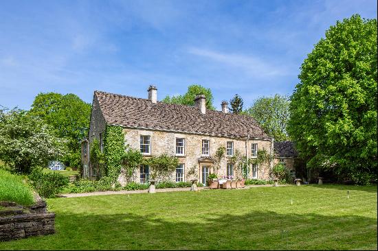 A beautiful Grade II listed Georgian country house set in pretty gardens and grounds on th