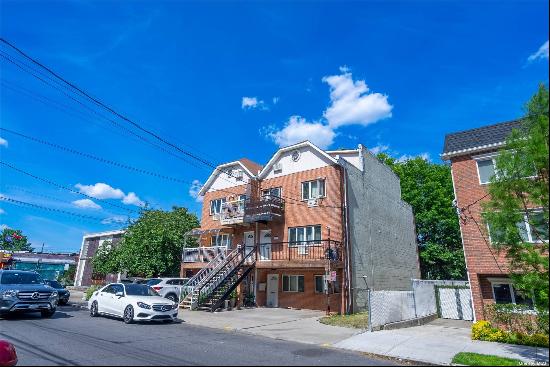 Experience the beauty of Sheepshead Bay living in this stunning 4 4-family house, featurin