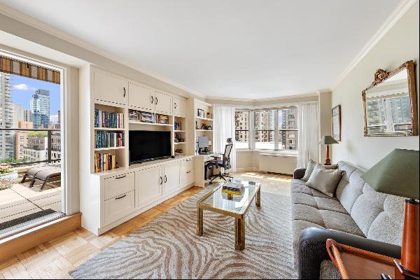 One of a kind gem with a private terrace in the heart of Upper East Side!This sun-drenc