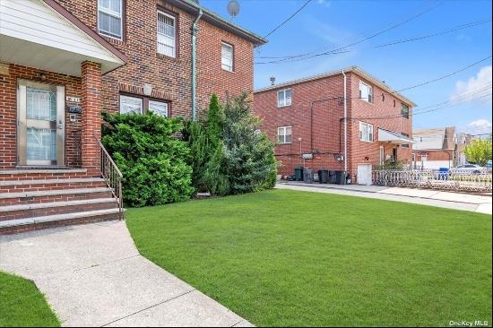 Located in desirable Whitestone, this brick Semi Attached 2 family home sits on a 41x100 *