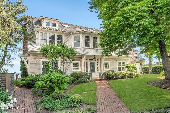 Direct Waterfront-Experience unparalleled waterfront living in this Nantucket Shingle-styl