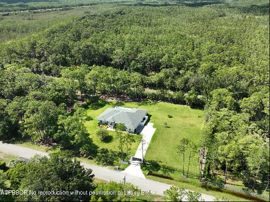 This newly constructed 3 bedroom + office, 3 bath pool home, sits on almost 1.5 acres, bac