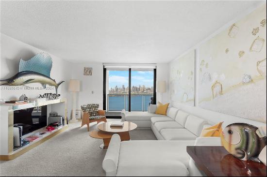 Experience unparalleled elegance in this exquisite Miami Beach condo. This luxurious 2-bed