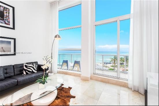 Nightly Rentals Allowed! Enjoy direct ocean views from your unique double height ceiling l