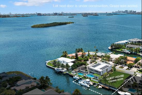 Step Inside with Me! A 150' waterfront compound in gated San Souci Estates. This double-lo