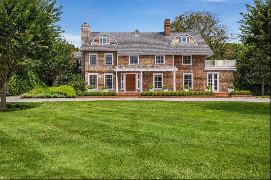 Discover an unparalleled opportunity to own a piece of Hamptons history with this stunning