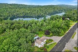 NEW ENGLAND FARMHOUSE ON HAYDEN POND WITH INCOME PRODUCING APARTMENT!