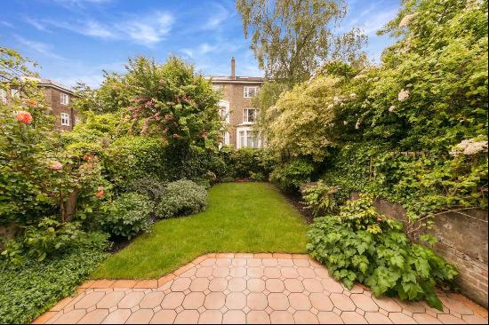 A 4 bedroom house for sale on Belsize Lane, NW3.