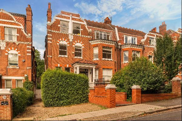 A 3/4 bedroom garden flat for sale on Langland Gardens, NW3.