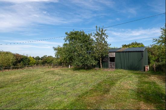 A detached agricultural building with consent to convert to a lovely two bedroom home in a