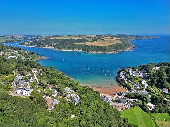 A waterfront home of exceptional quality with far-reaching sea and estuary views.