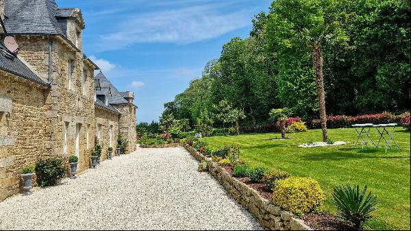 Elegant manor set on nearly 2.5 acres of landscaped park near a medieval city