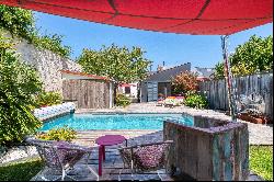 Fully renovated single-story house with a pool.