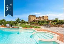 Agritourism with 4 Apartments, Garden with Pool and Olive grove for Sale in Pienza in the 