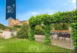 Agritourism with 4 Apartments, Garden with Pool and Olive grove for Sale in Pienza in the 