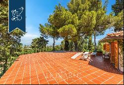 Stunning villa with a designer pool and a panoramic view of the Tuscan sea for sale in Liv