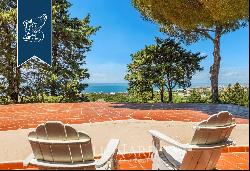 Stunning villa with a designer pool and a panoramic view of the Tuscan sea for sale in Liv