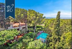 Stunning villa with a designer pool and a panoramic view of the Tuscan sea for sale in Liv