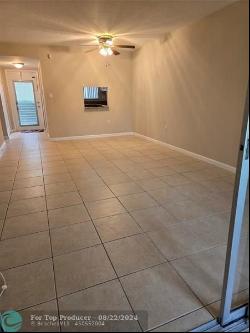 8590 Sunrise Lakes Blvd #106, Sunrise FL 33322