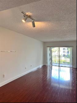 9645 NW 1st Ct Unit 1-208, Pembroke Pines FL 33024