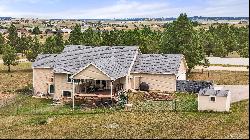 Stunning custom rancher perfectly situated on a picturesque 5 acre parcel