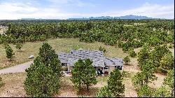 Stunning custom rancher perfectly situated on a picturesque 5 acre parcel