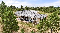 Stunning custom rancher perfectly situated on a picturesque 5 acre parcel