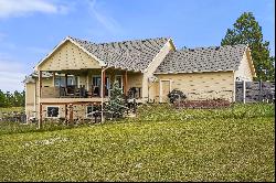 Stunning custom rancher perfectly situated on a picturesque 5 acre parcel