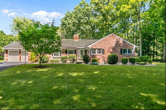 Embrace the ease of one-floor living in this generously sized brick ranch