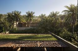 House surrounded by greenery in Trancoso