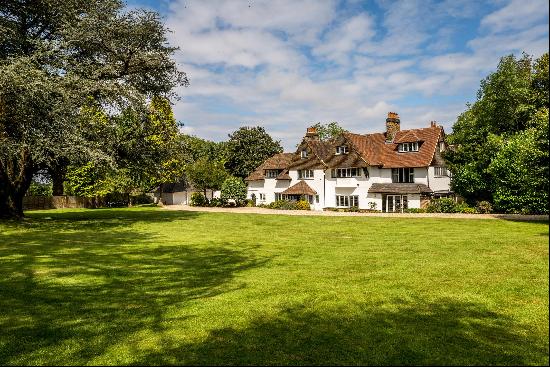 A recently updated family home set in a semi-rural setting and in over two acres of lovely