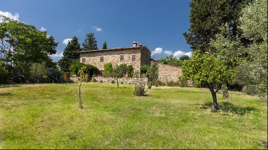 A charming farmhouse with outbuildings and land, with the potential for further renovation