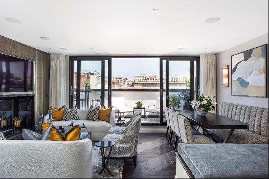 A luxury three bedroom penthouse apartment to rent in Kensington, W8