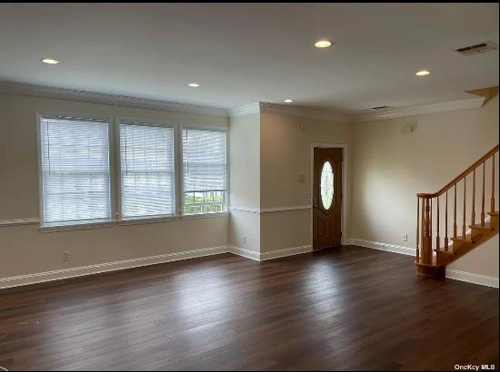 Bright and spacious water view Townhouse Duplex featuring living room/dining area, eat-in 