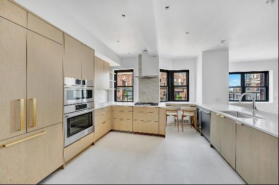 Step into this exquisitely renovated 3-bedroom, 3.5-bathroom residence, perched high on th