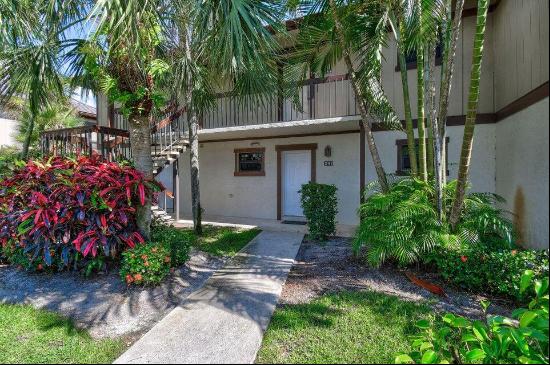 Welcome to this beautifully renovated one-bedroom condo in Palm Beach Polo Club nestled in