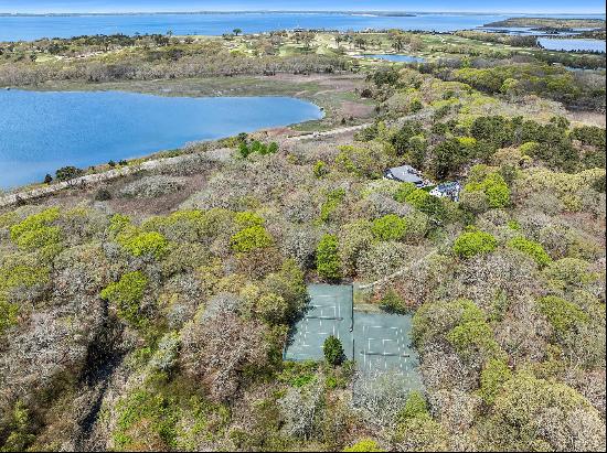 Located on a .76 acre lot,  across from a preserve and set far back off the road is this 4