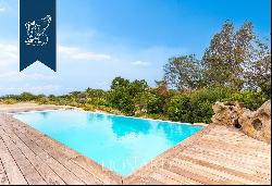 Exclusive estate with a garden and a panoramic pool with a view of Sardinia's coast