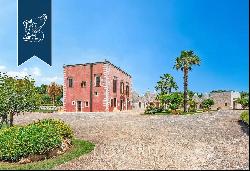 Wonderful renovated farmstead surrounded by olive groves and forests for sale in the Trull