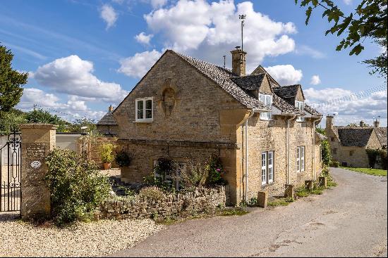 A quintissential Cotswold stone cottage in this highly sought-after village with far reach