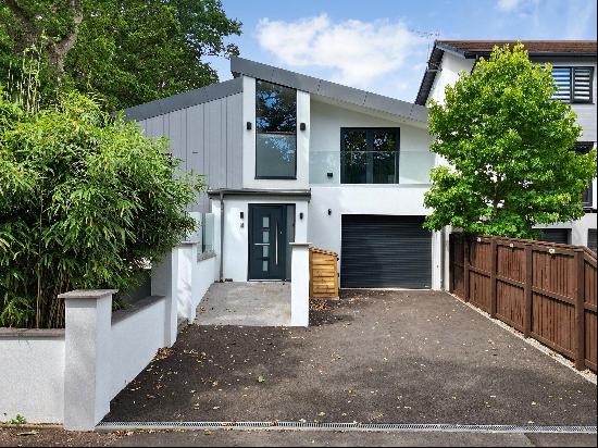 A striking modern home with four bedrooms and stylish accommodation, in a sought-after Exm