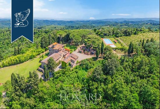 Majestic 18th-century villa surrounded by vineyards, fields and forests on Pisa's hills