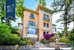 Elegant villa with a private garden and an independent apartment for sale on the Riviera d