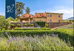 16th-century villa with an Italian-style garden for sale in the province of Florence