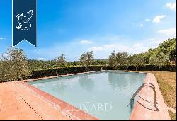 Refined farmhouse with a pool and a private lake for sale near Siena